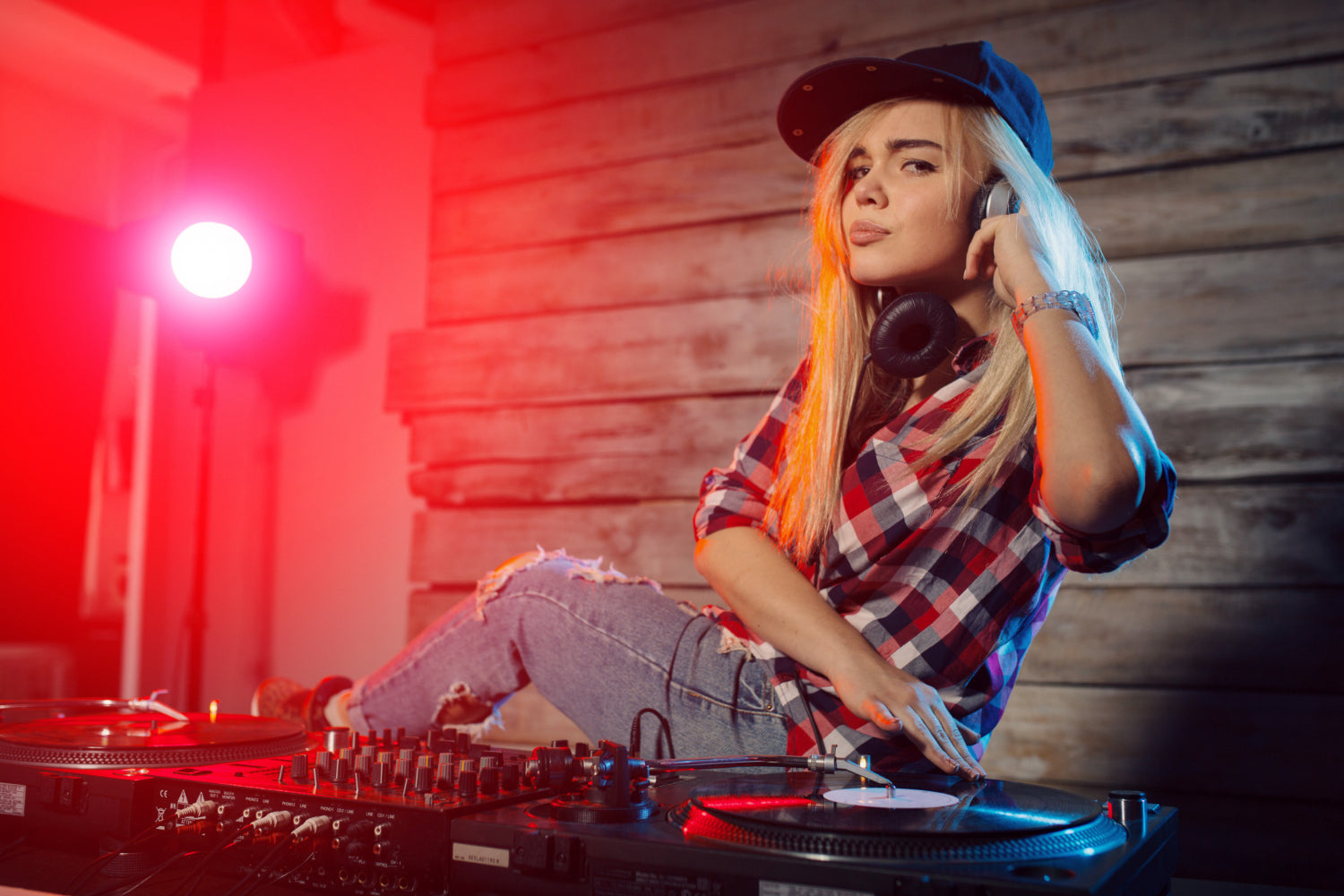dj girl in sunglasses touching dj equipment in nightclub with smoke Stock  Photo - Alamy